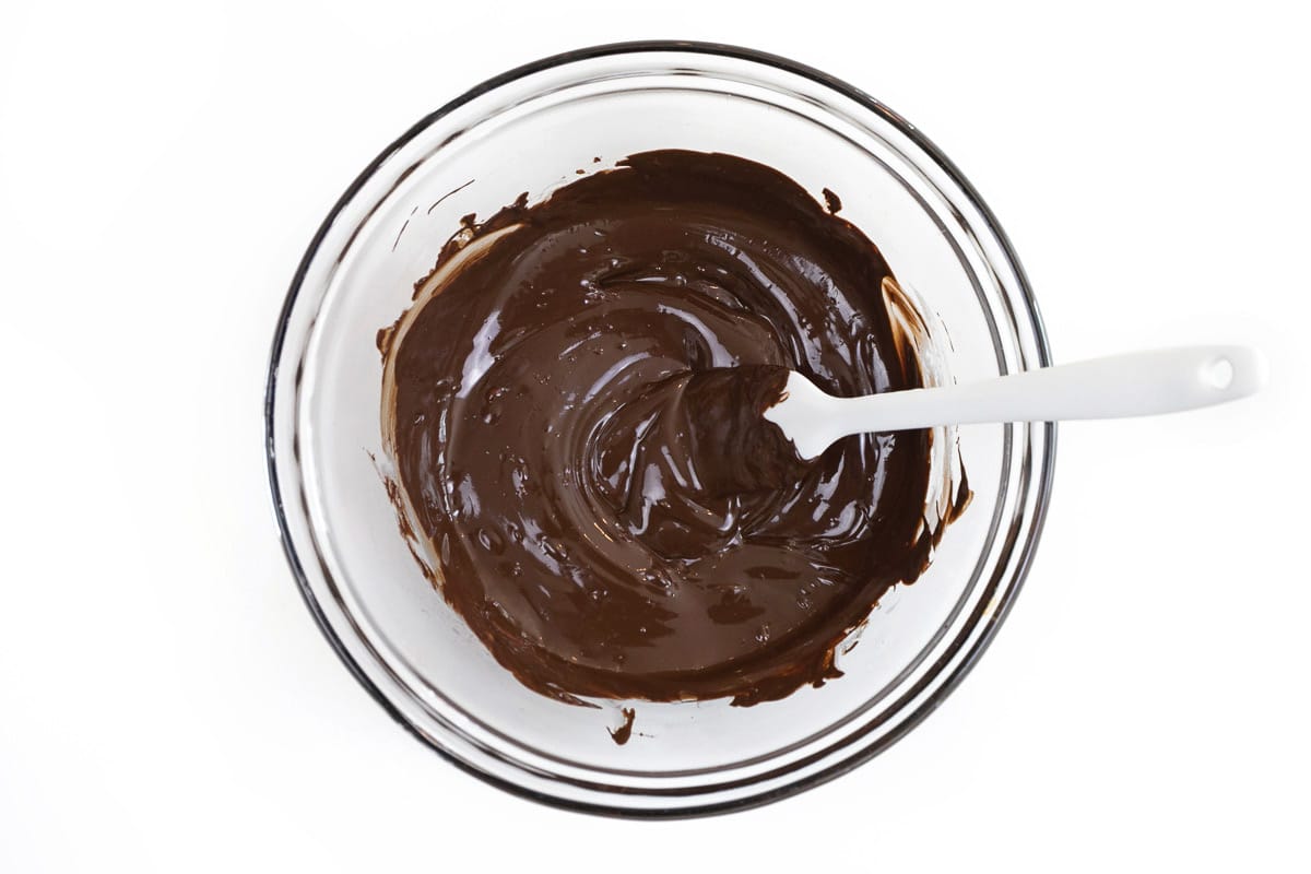 Melted chocolate chips in a microwave-safe bowl.