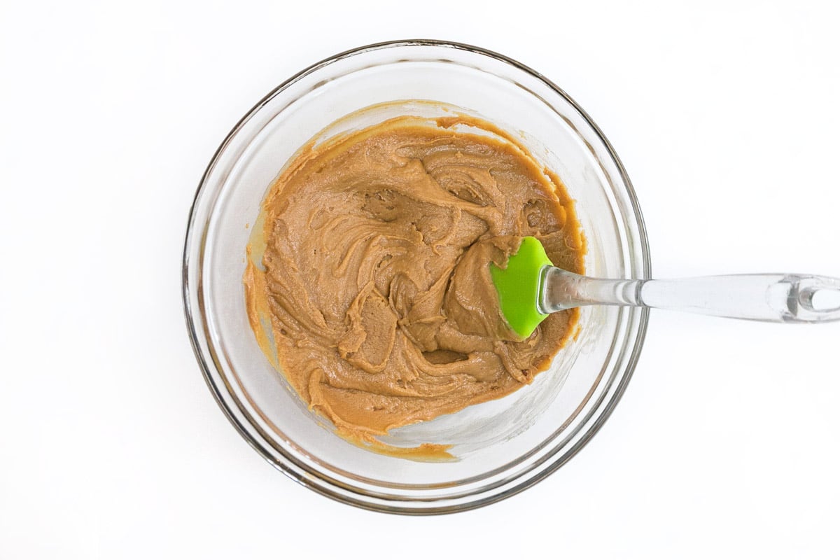 Microwave the sweetened condensed milk and creamy peanut for thirty seconds, then stir, then repeat for thirty more seconds.