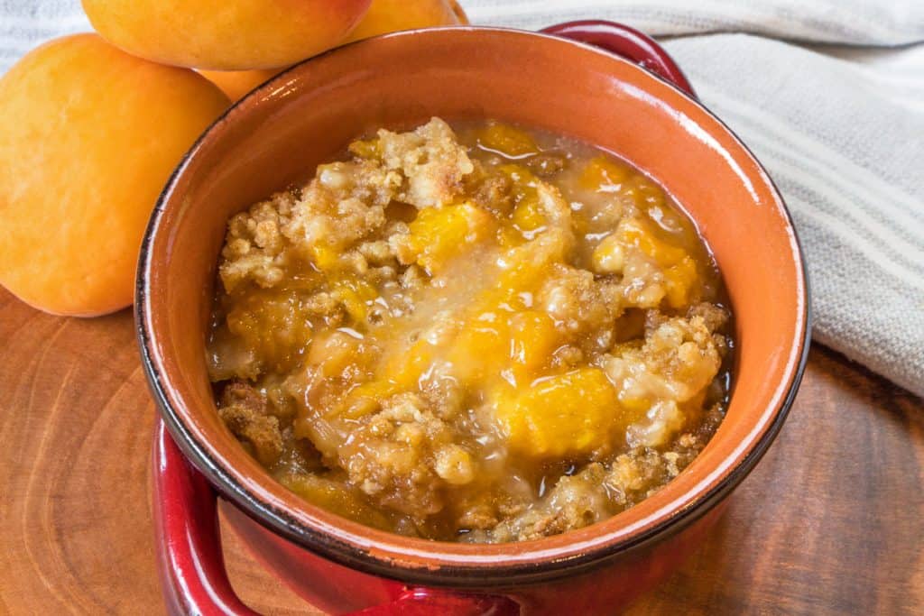 Apricot crisp in a bowl.