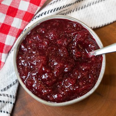 Cranberry sauce with orange juice recipe in a bowl.