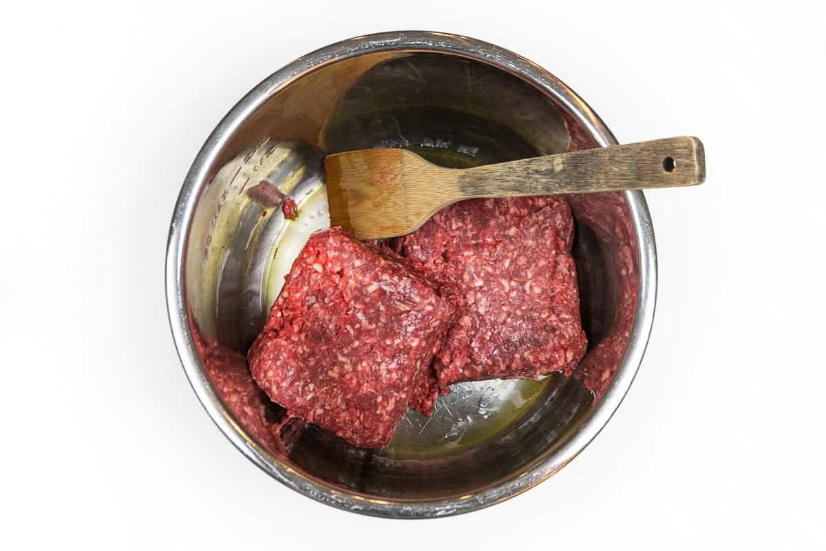 Olive oil and ground beef in the Instant Pot.