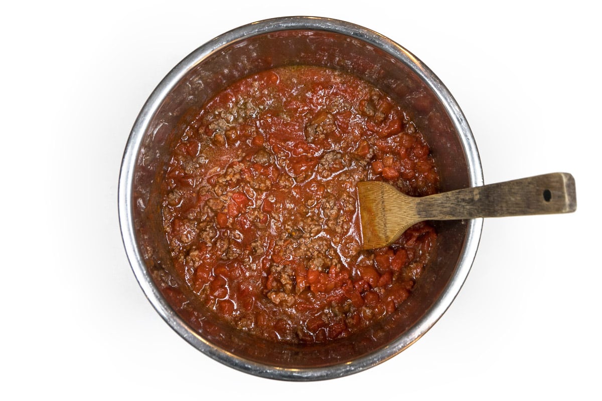 Pasta sauce, Italian diced tomatoes, petite diced tomatoes together with browned ground beef.