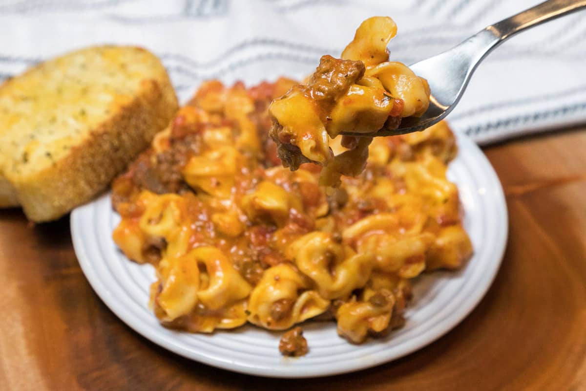 Cheesy Instant Pot tortellini on a plate.