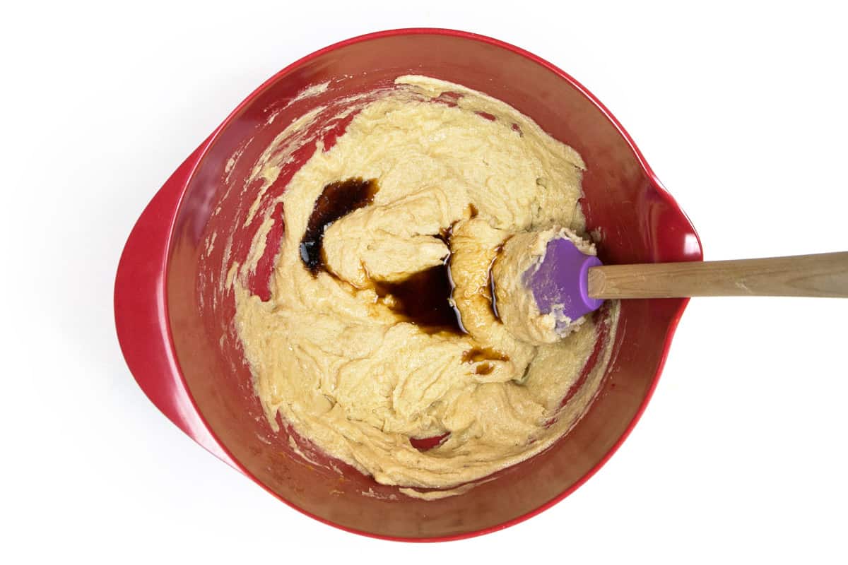 The vanilla extract is mixed together with the eggs, softened butter, granulated sugar, and light brown sugar.