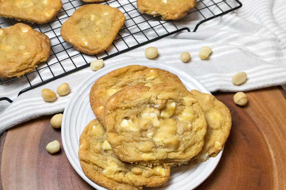 White chocolate macadamia nut cookies on a plate.