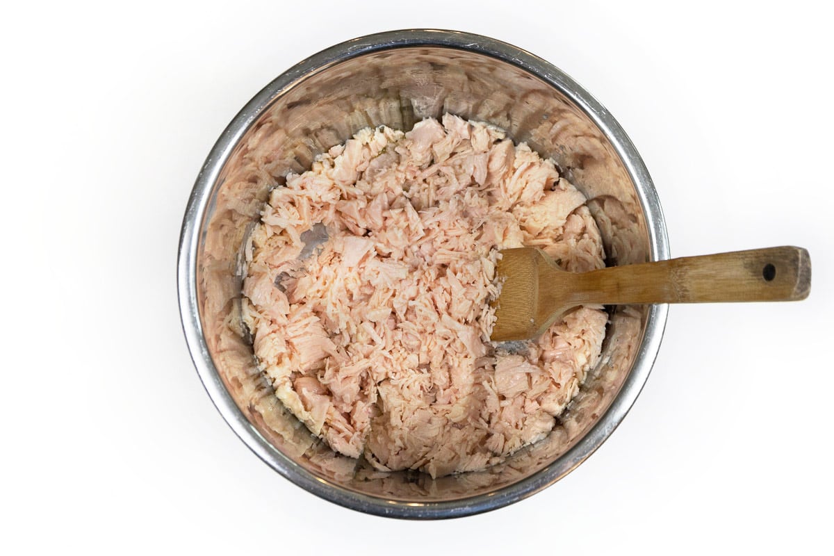 Add the chunk chicken breast to the Instant Pot.