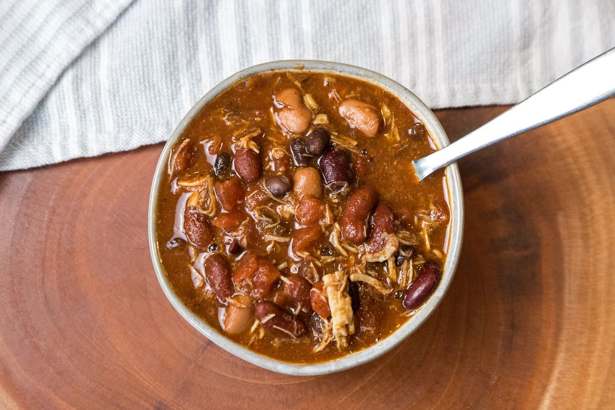 Chicken chili with black beans in a bowl.