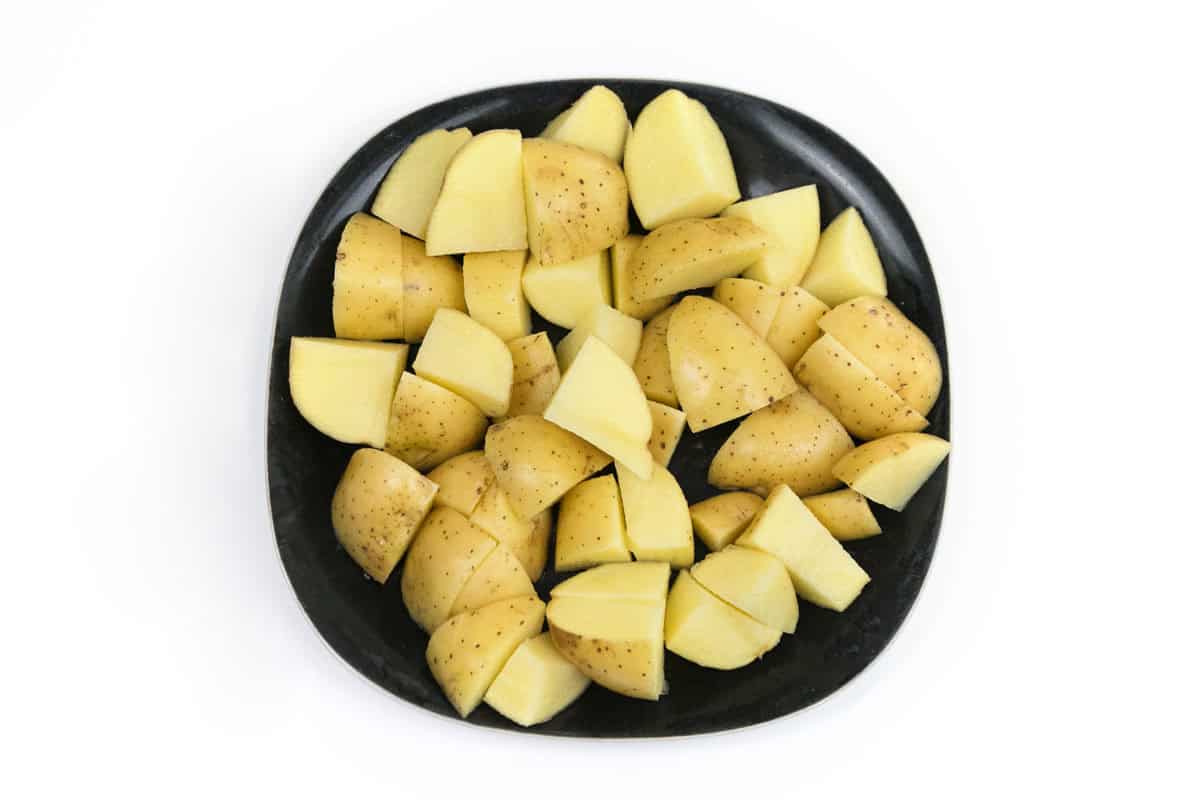 Cut potatoes on a plate.