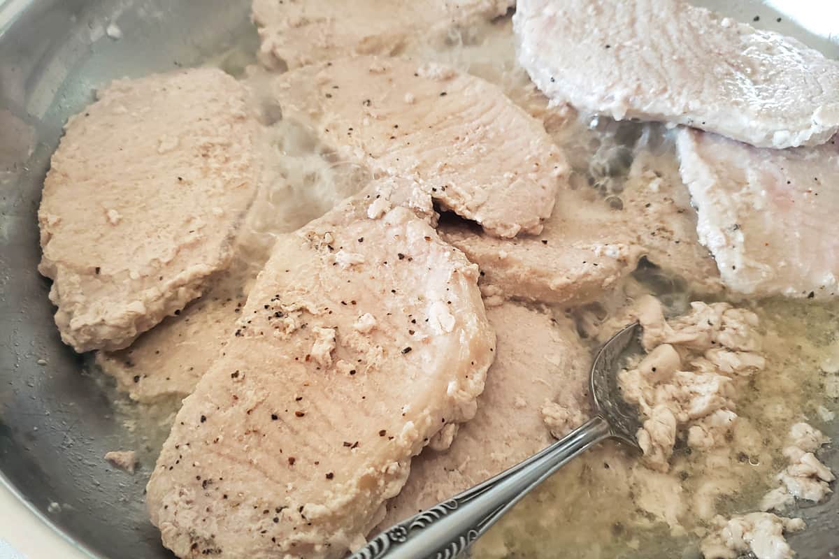 pork chops frying