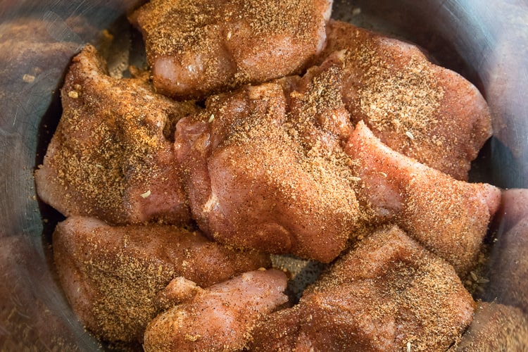 Seasoned pork added to the instant pot.