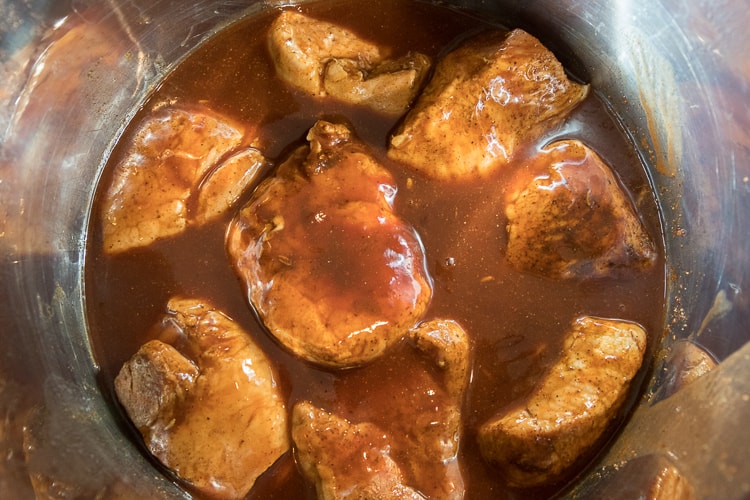 Liquid seasoning sauce added to the pork in the instant pot.