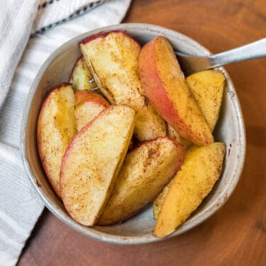 Air fryer apples recipe in a bowl.