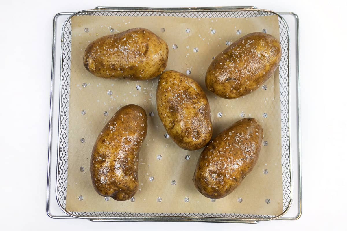 Sprinkle kosher salt on the potatoes.