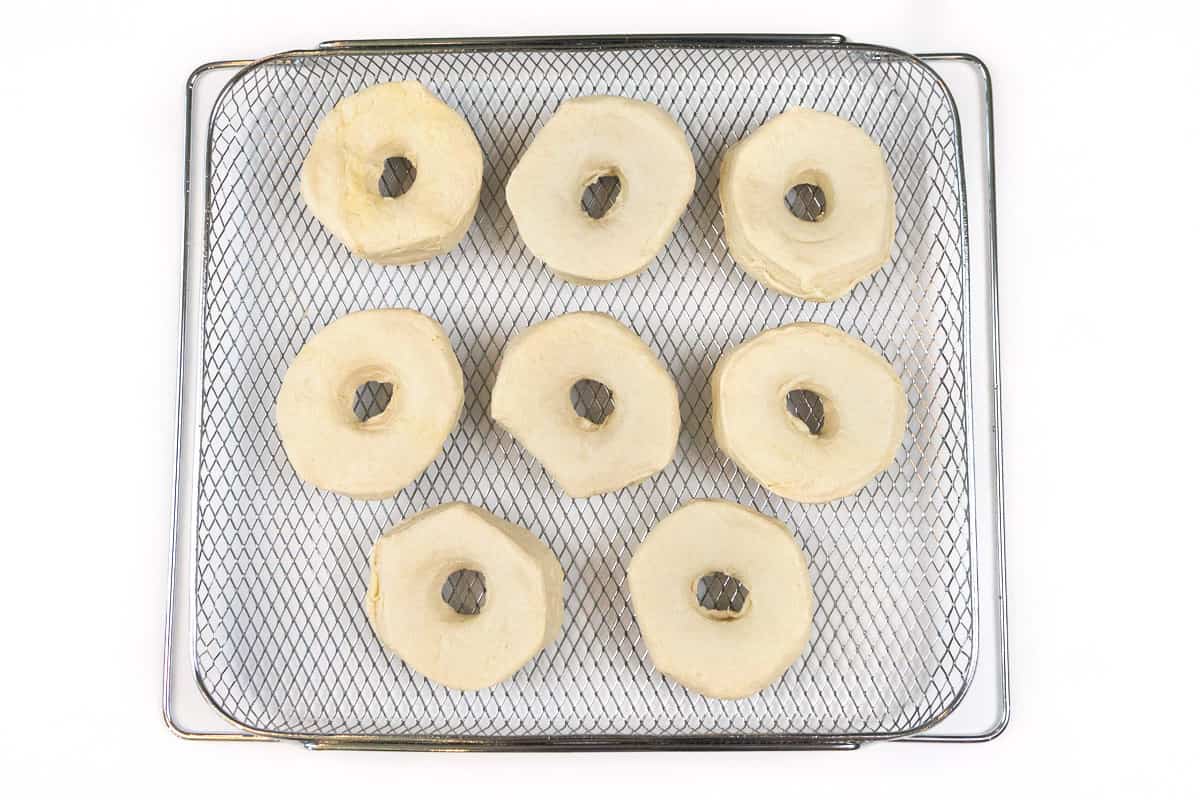 Place the biscuit donuts on the air fryer basket.