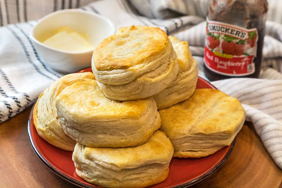 A bunch of biscuits on a plate after being air fried.