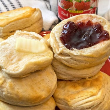 Air fryer canned biscuits recipe with butter and jam.