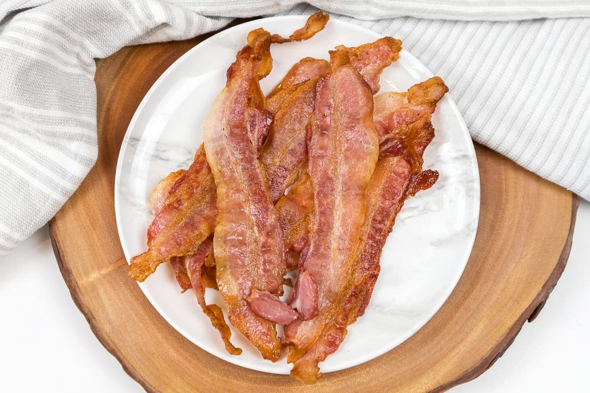Air fry bacon on a plate.