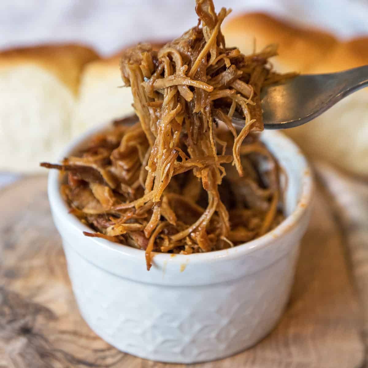 Pulled pork for sliders in a small bowl.