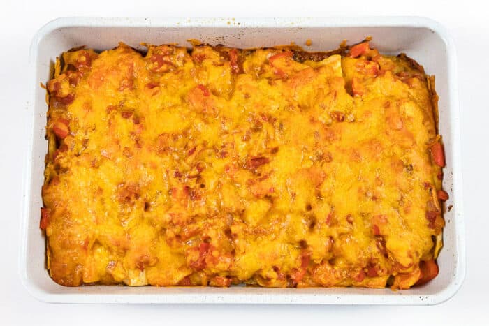 Beef enchiladas were baked in the oven at three hundred and fifty degrees for thirty minutes.