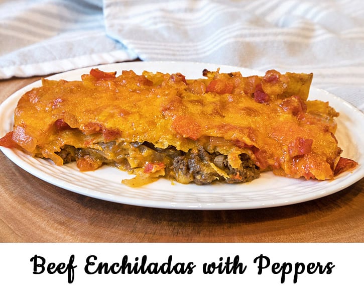 Beef enchiladas on a plate.