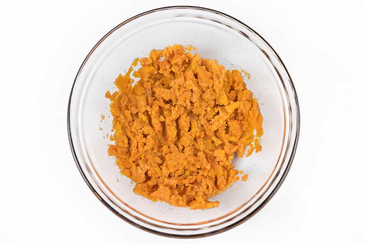 Mashed sweet potatoes in a bowl.