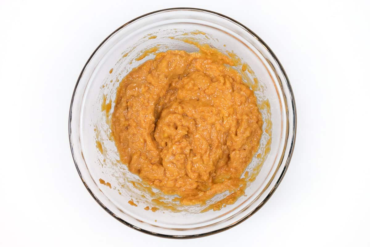 The beaten eggs are mixed with the mashed sweet potatoes.