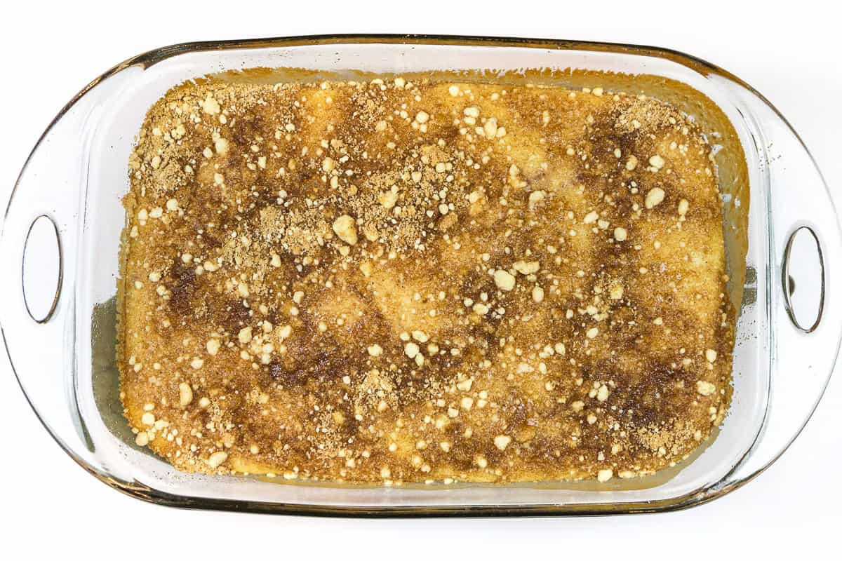 Baked cherry coffee cake in a baking dish.