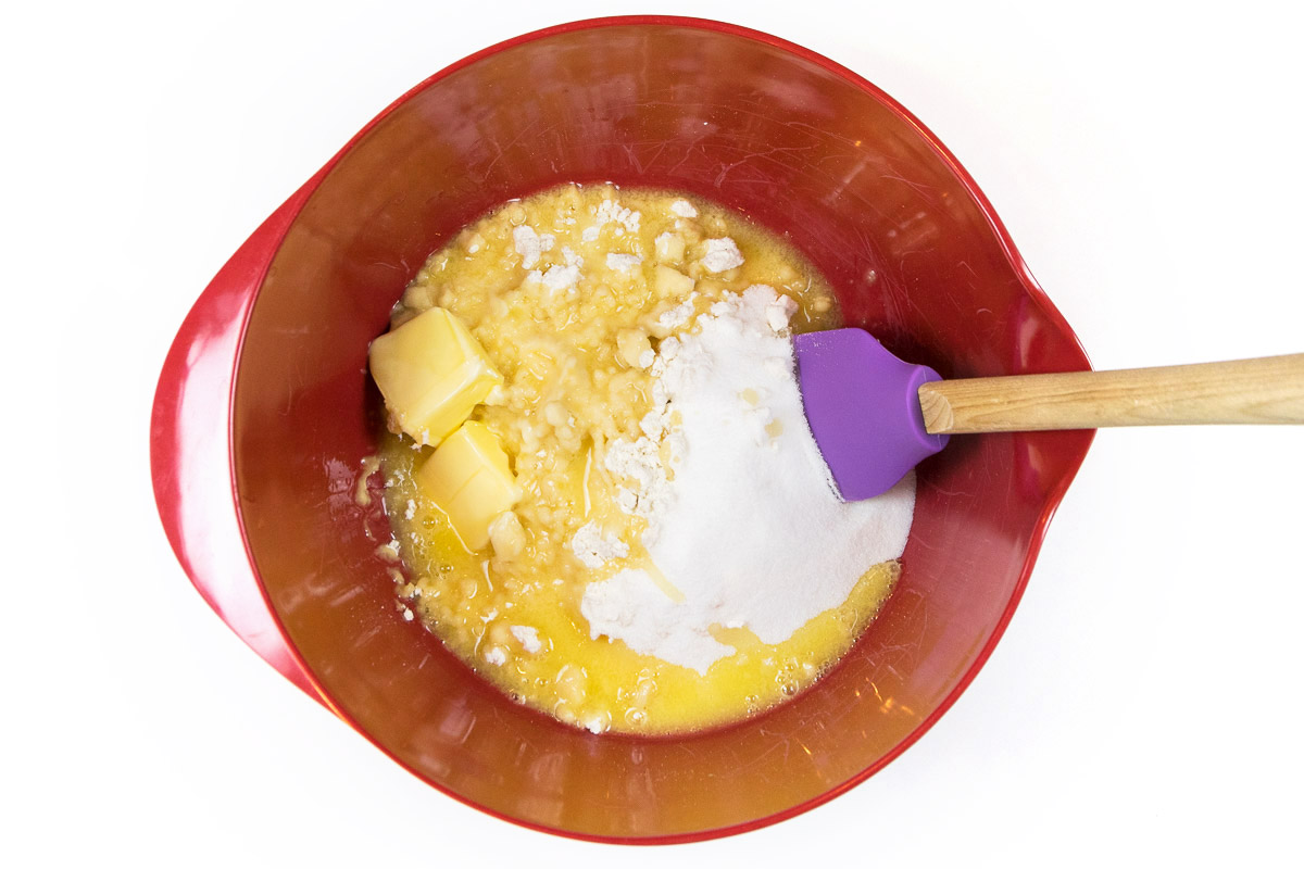 Pillsbury hot roll mix, soft butter, and sugar in a bowl.