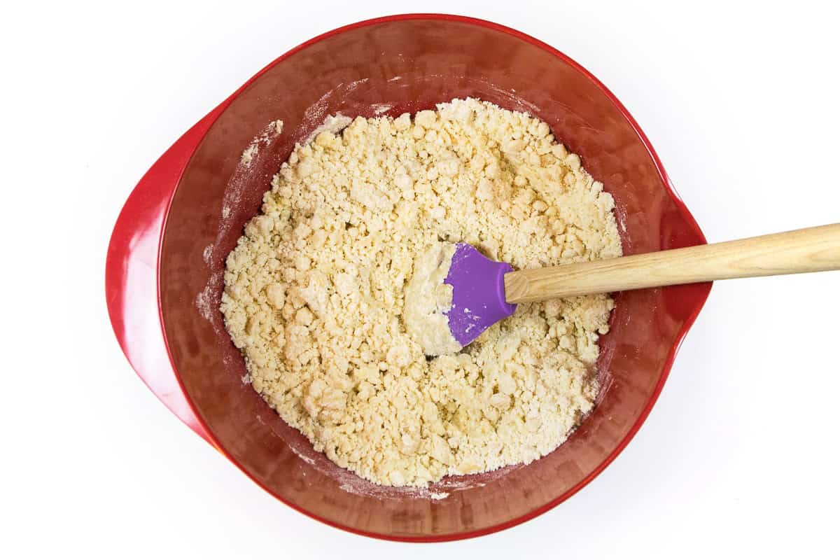 Pillsbury hot roll mix, soft butter, and sugar mixed in a bowl.