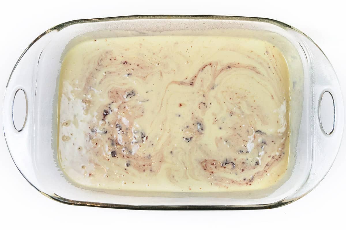 Swirl the cherry preserves and almond extract into the coffee cake batter.