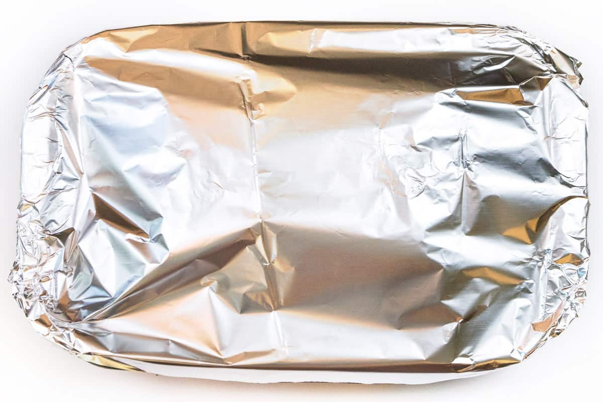 Cover the baking dish with aluminum foil.