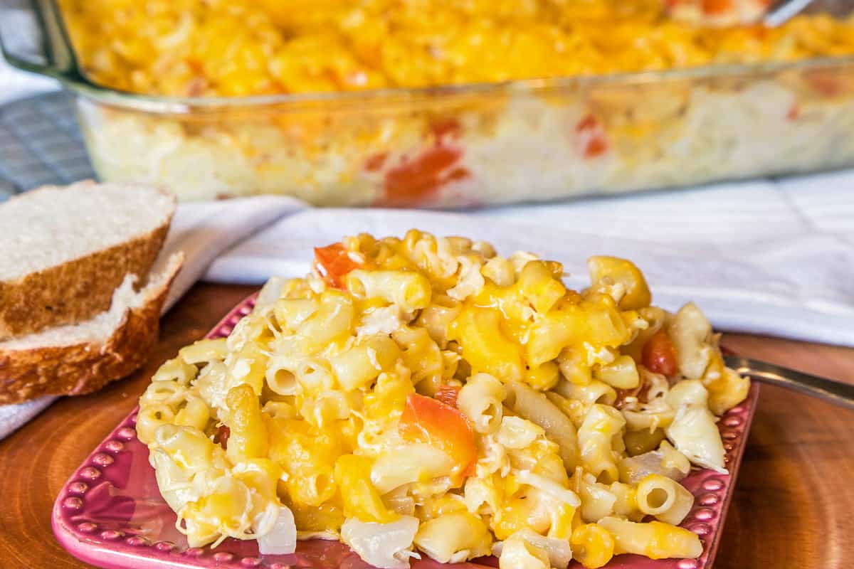 Baked cheesy canned chicken noodle casserole on a plate.