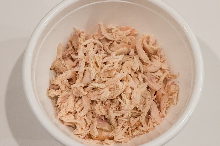 Shredded chicken in a bowl.