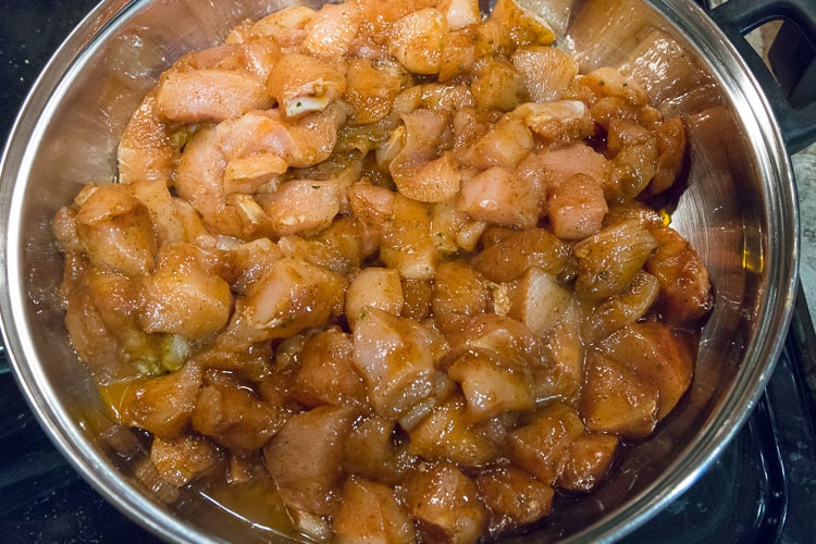 Fry the chicken-marinade mixture in the frying pan.