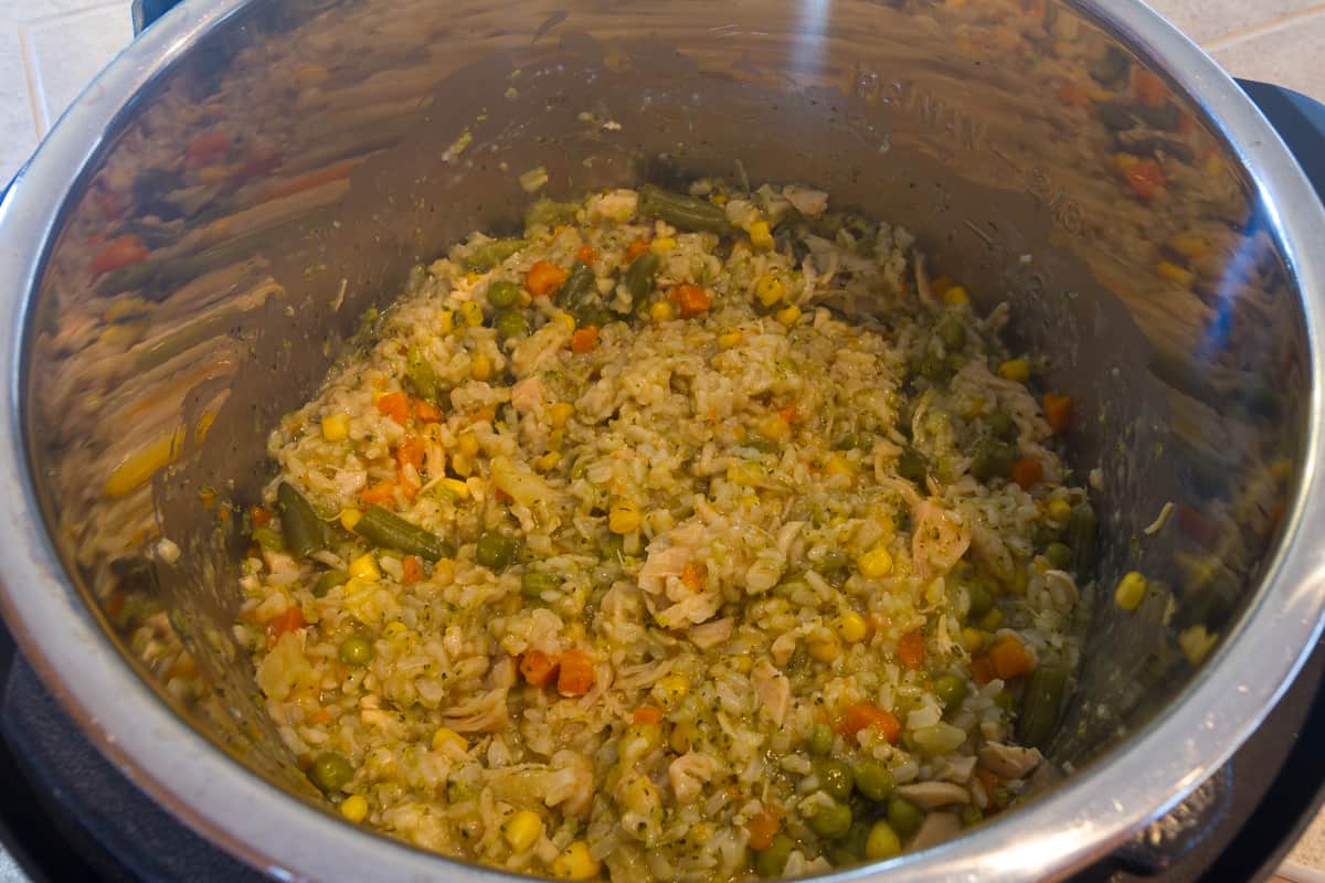 The chicken rice mixture has cooked for twenty-six minutes in the instant pot.