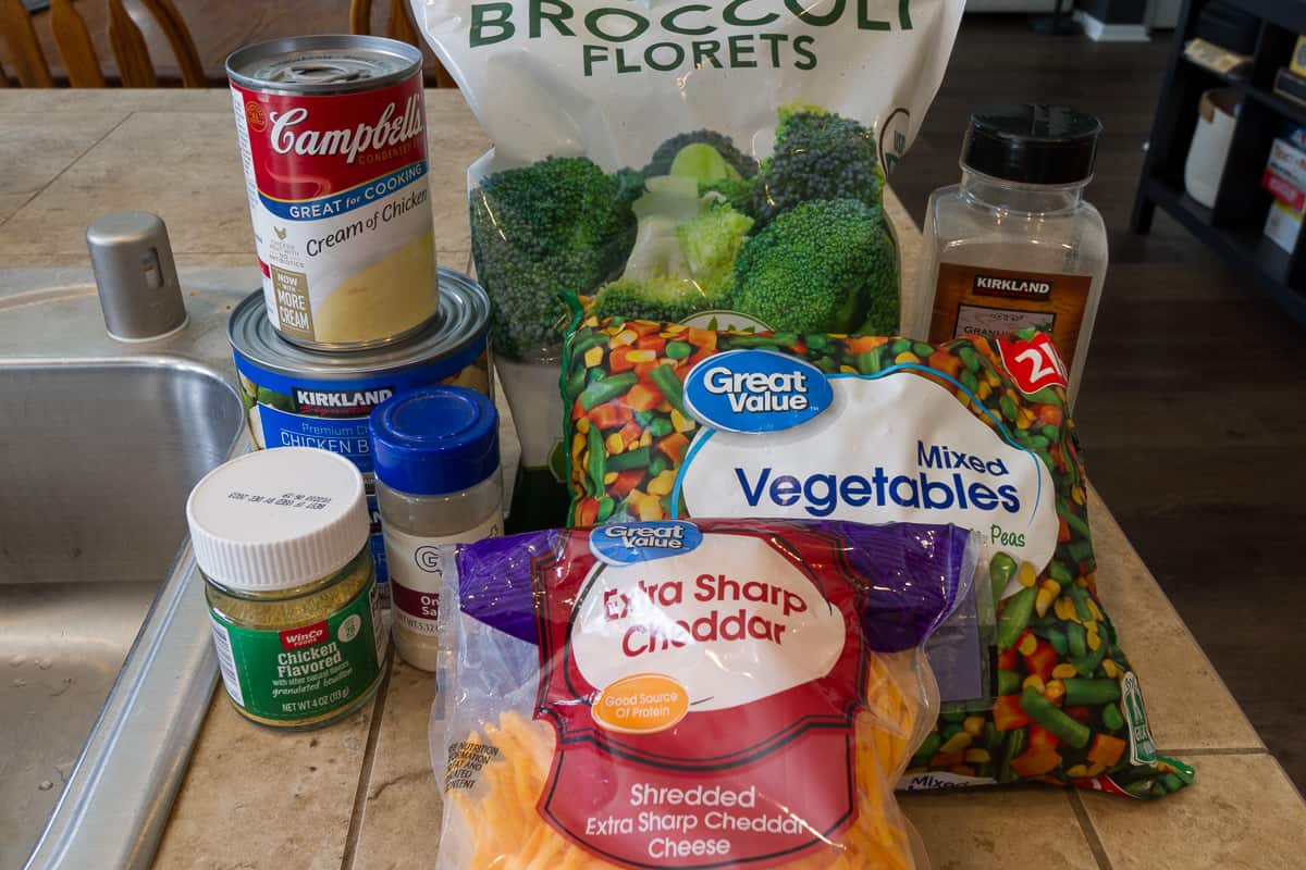 Ingredients for cheesy chicken and rice casserole dinner.