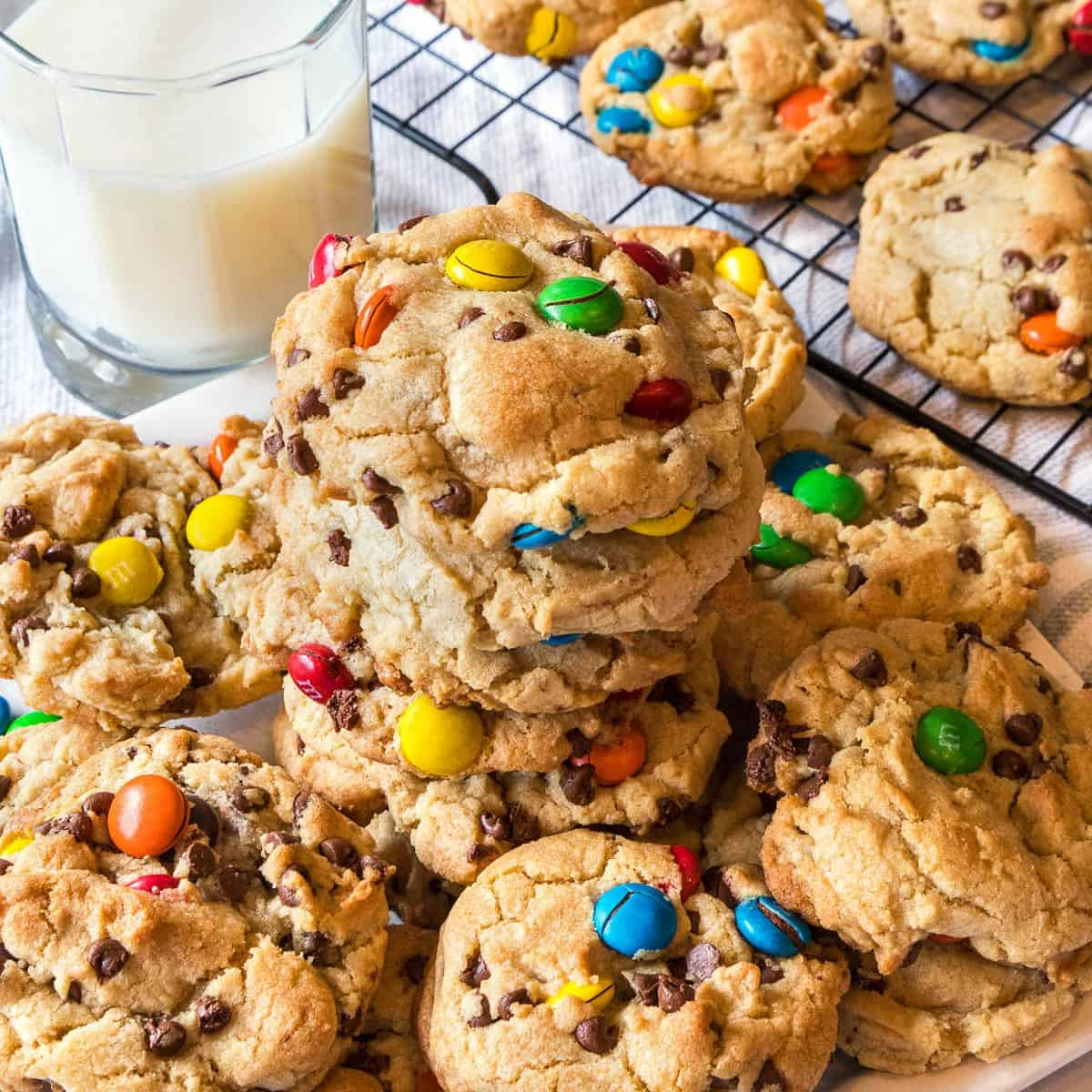 Chocolate chip m&m cookies and a glass of milk.