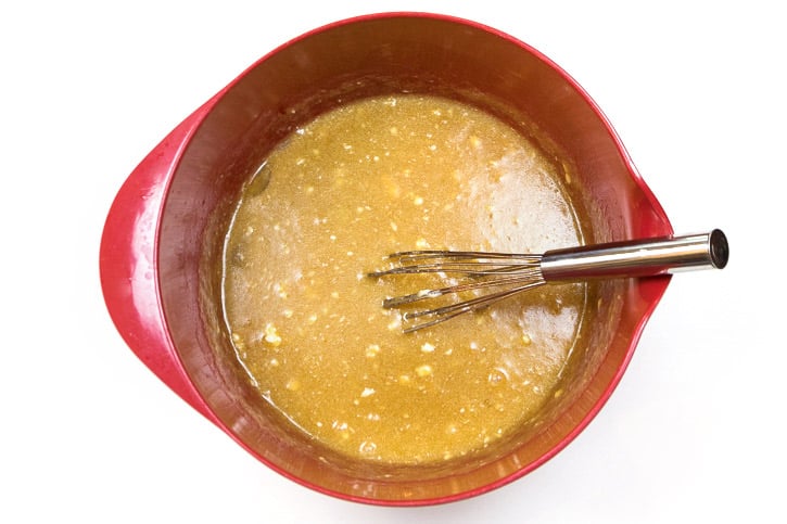 In a different bowl, add the light brown sugar, granulated sugar, large eggs, vanilla extract, and the melted butter. Whisk it up altogether in the bowl.