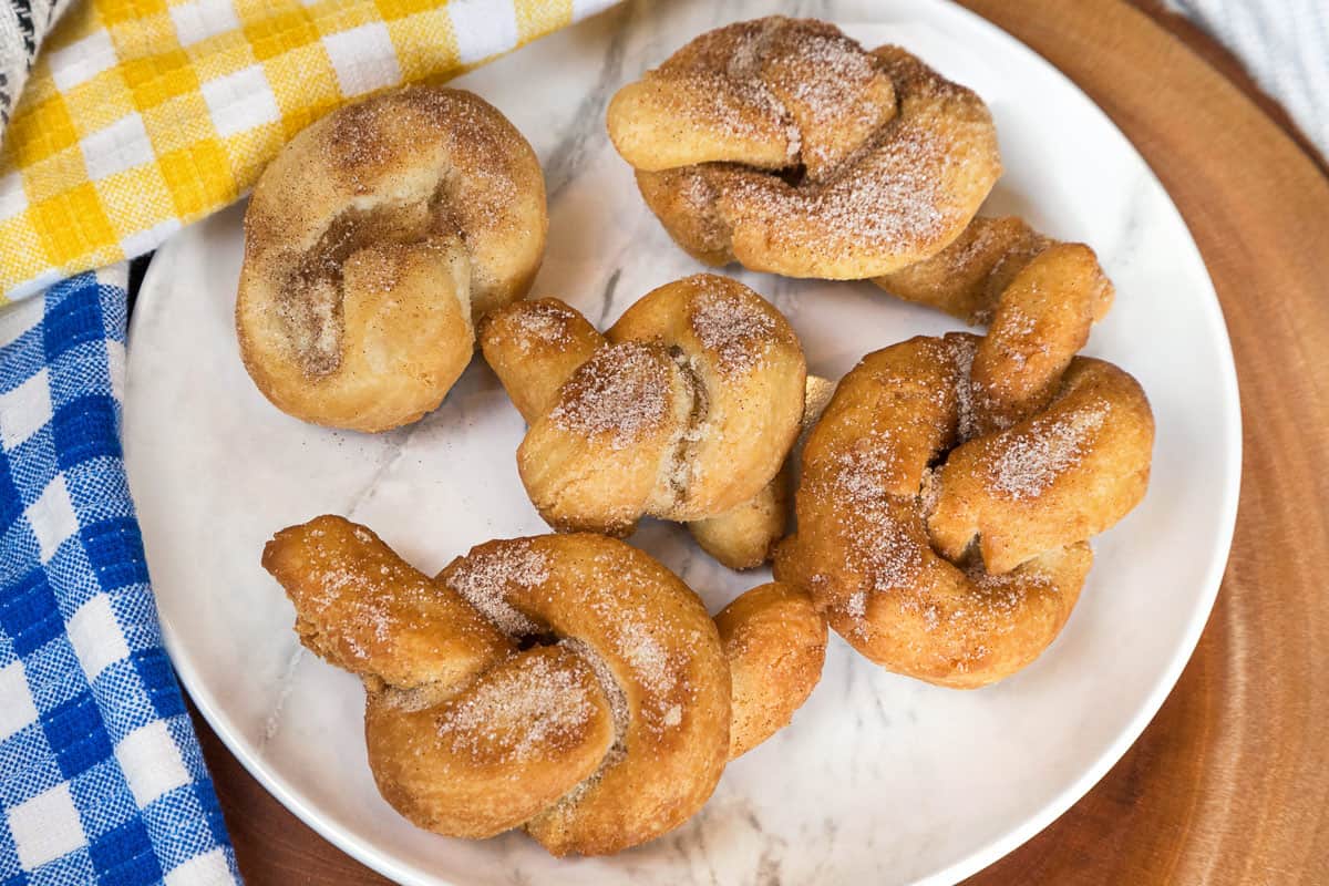 Cinnamon sugar knots on a plate.