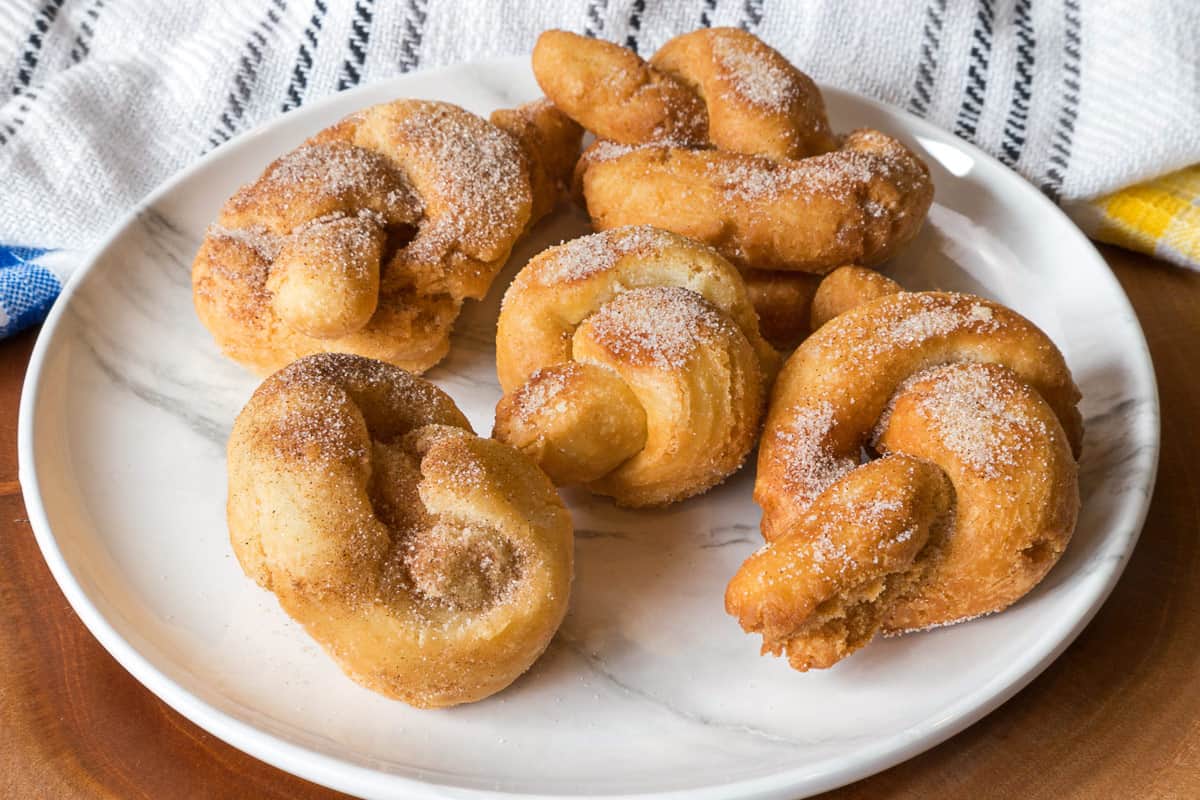 Cinnamon sugar knots on a plate.