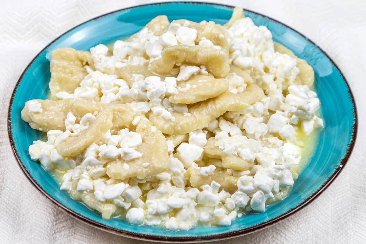 A plate of cottage cheese pierogi.
