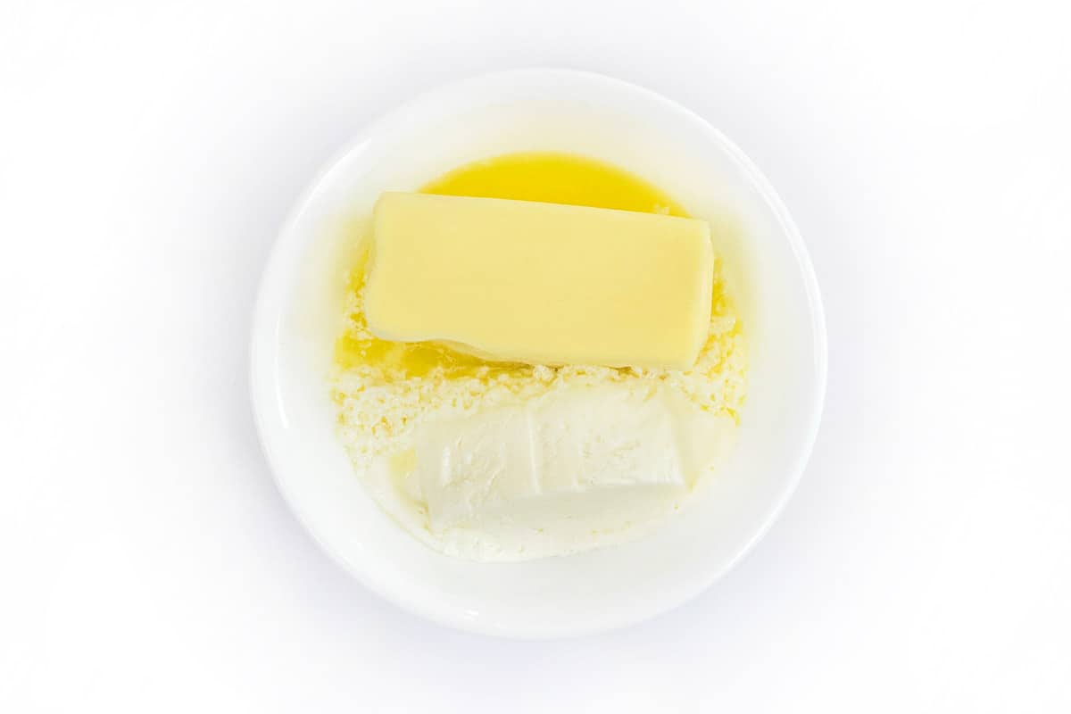 Butter and cream cheese in a bowl.