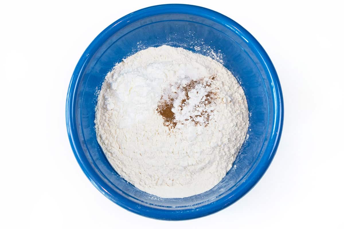 Two and one-half cups of flour, one tablespoon of cornstarch, one-half teaspoon of baking powder, three-fourths of a teaspoon of salt, and one-fourth of a teaspoon of ground cinnamon blended together to make the flour mixture.