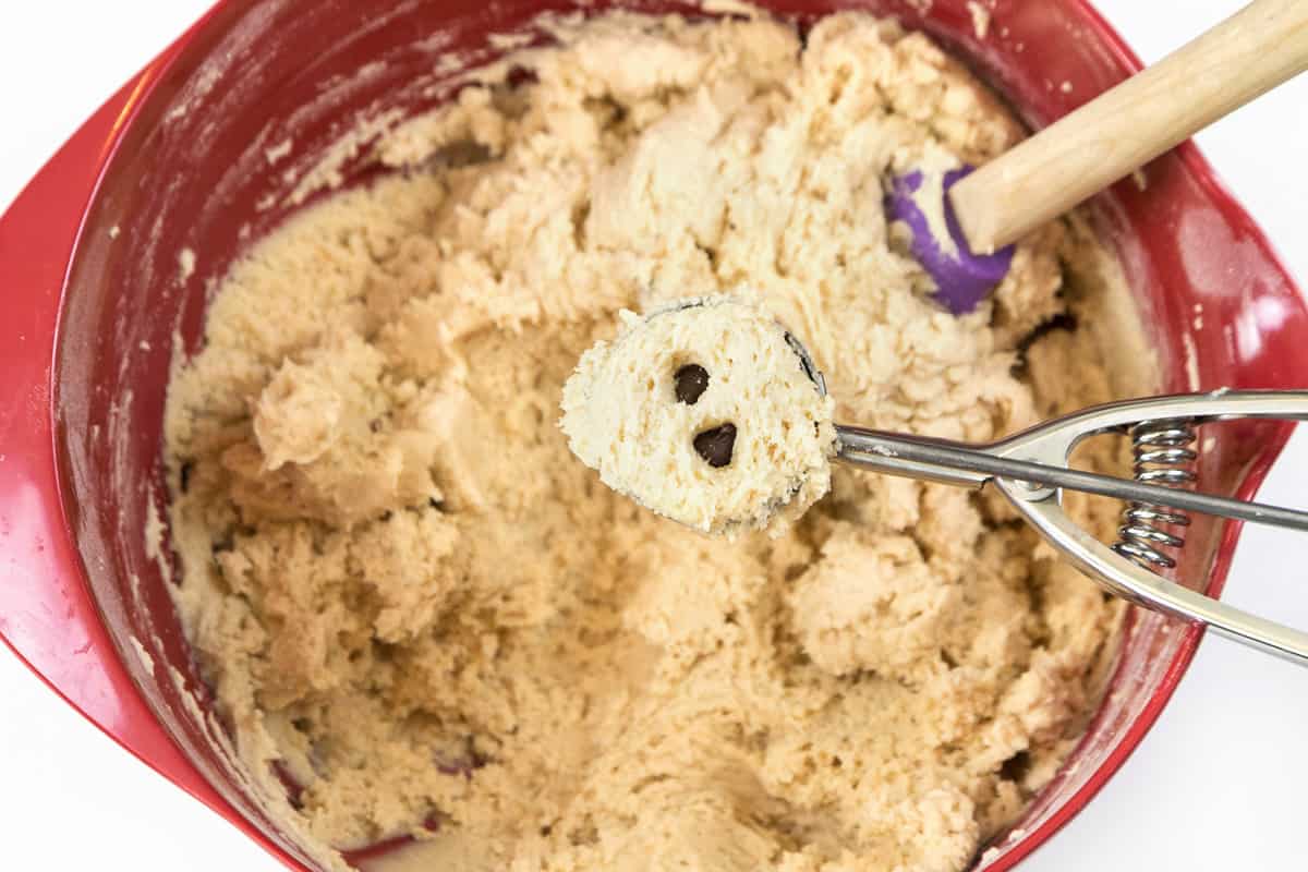 Hide two to four chocolate chips inside the cookie dough.