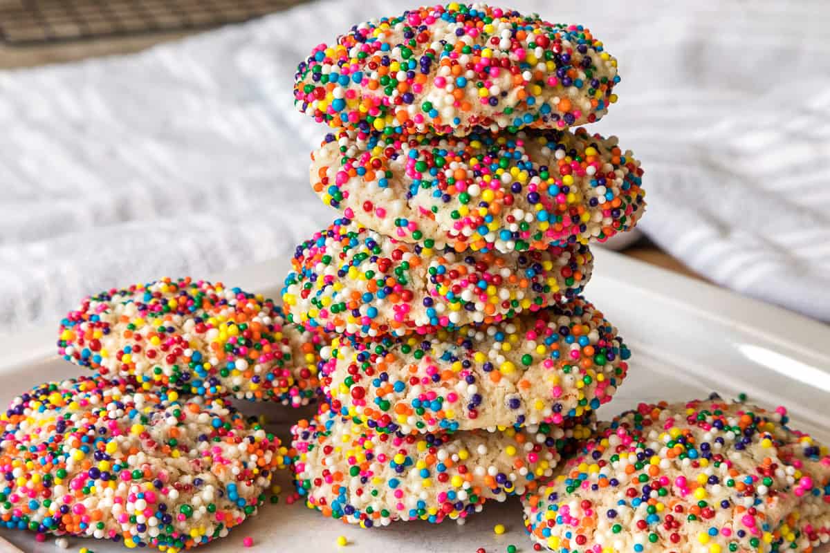 A stack of Cream Cheese Cookies with Sprinkles.
