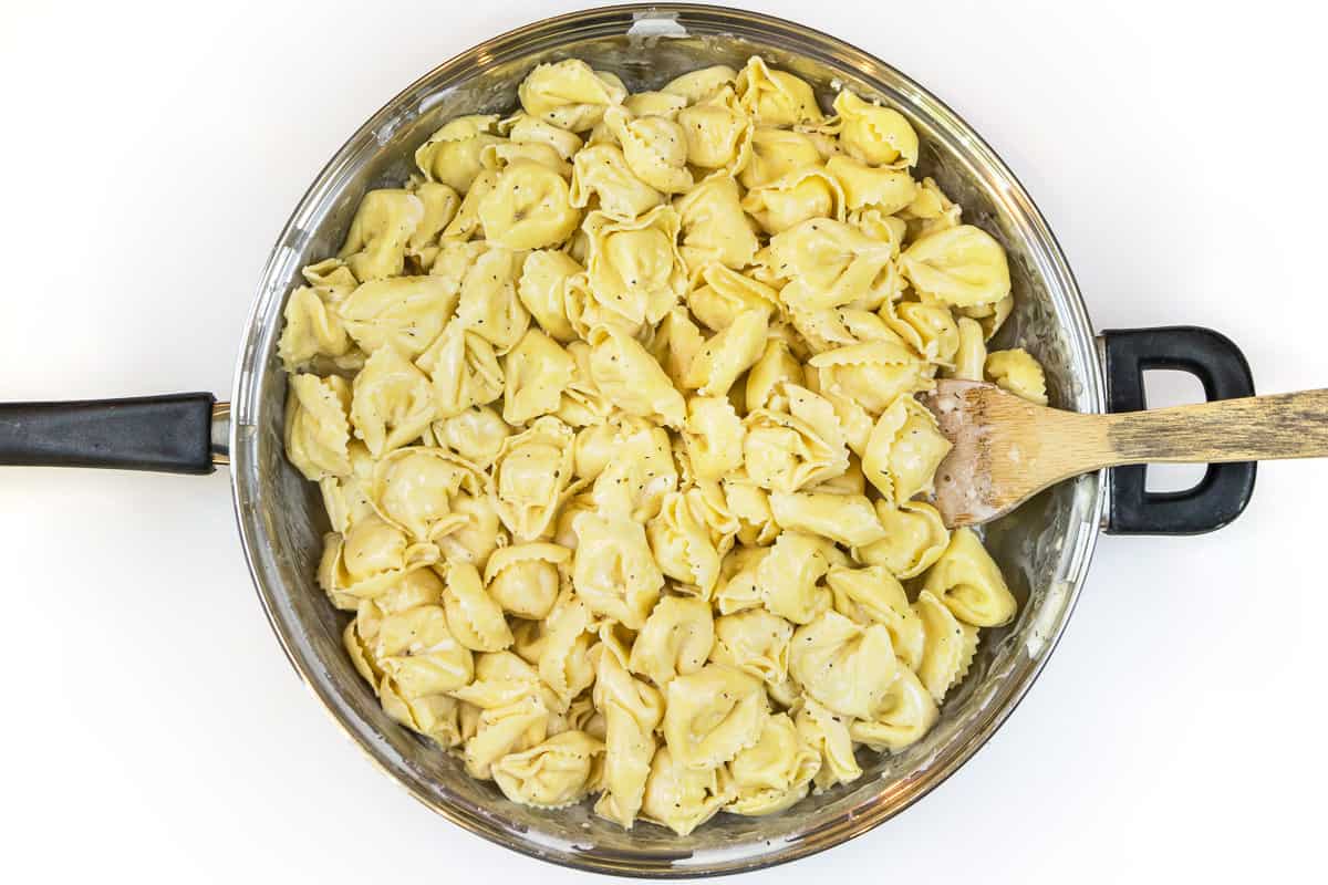 Creamy Cheese Tortelloni in a frying pan.