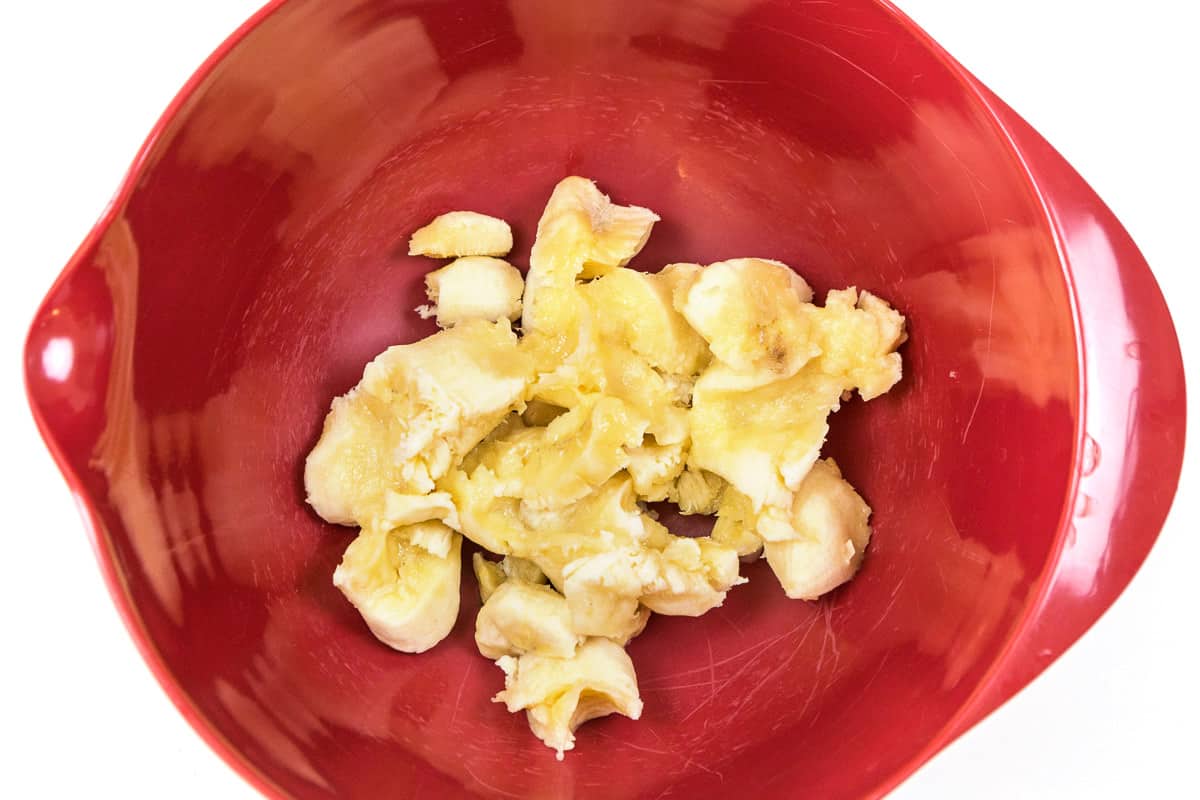 Three ripe bananas in a bowl.
