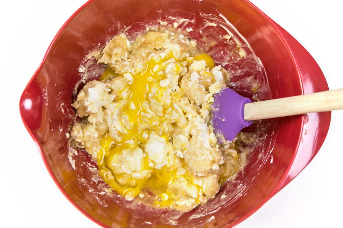 Two eggs are added to the banana mixture.