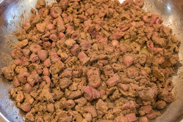 Chicken hearts browning with the chicken liver.