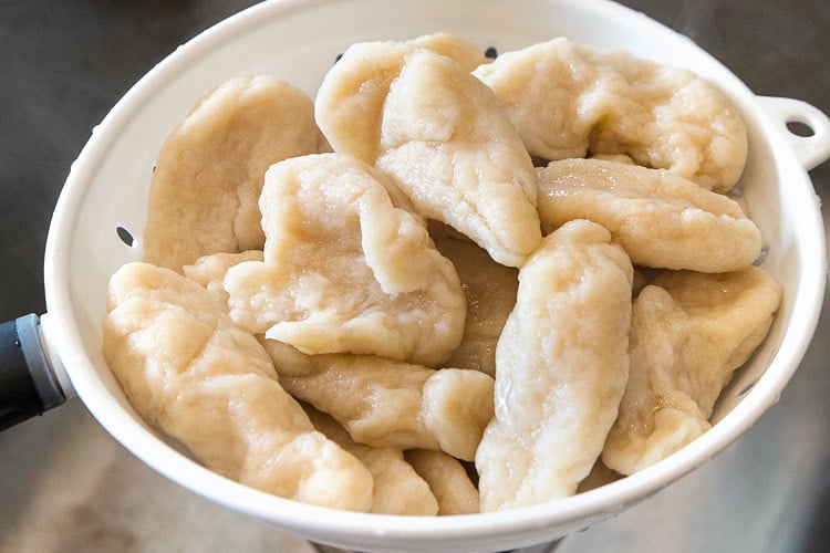 Rinse dumplings in cold water.